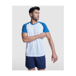 Zweifarbiges Kinder-Sportshirt kurzarm 140 g/m² Roly Indianápolis farbe neongrün Lifestyle-Bild