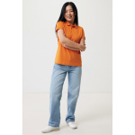 Damen-Piqué-Poloshirt aus recycelter Baumwolle, 220 g/m², Iqoniq farbe orange Ansicht mit Modell