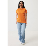 Damen-Piqué-Poloshirt aus recycelter Baumwolle, 220 g/m², Iqoniq farbe orange zweite Ansicht mit Modell