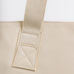 Umhängetasche aus Kunstleder mit versteckten Taschen und Trolleyband