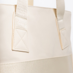 Umhängetasche aus Kunstleder mit versteckten Taschen und Trolleyband