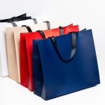 Premium Papiertüte matt mit Stoffgriffen und Seitenfalte