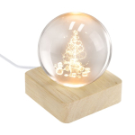 Weihnachtliche Glaskugel mit Holzsockel und warmem Licht