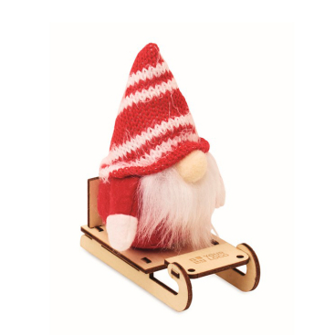 Weihnachtsdekoration aus Holz: Wichtel auf Schlitten, mit Baumwolle gefüllt